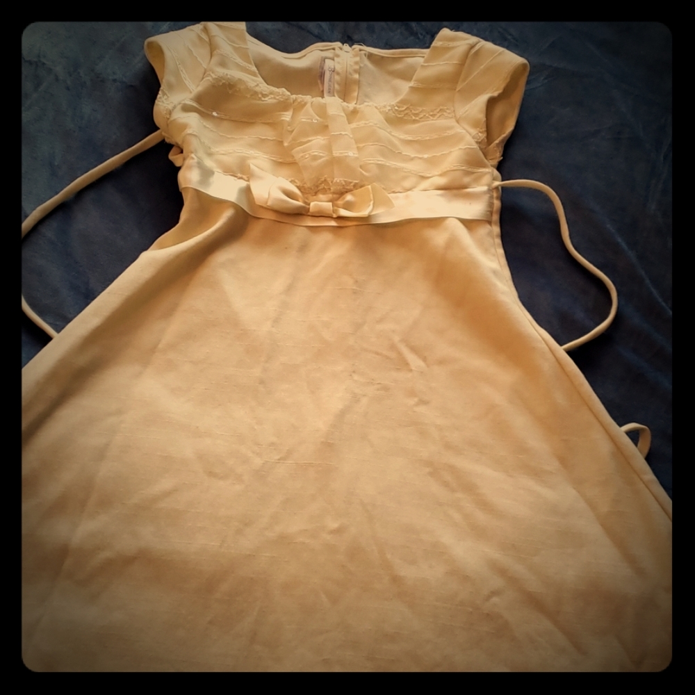 Yellow tea length dress